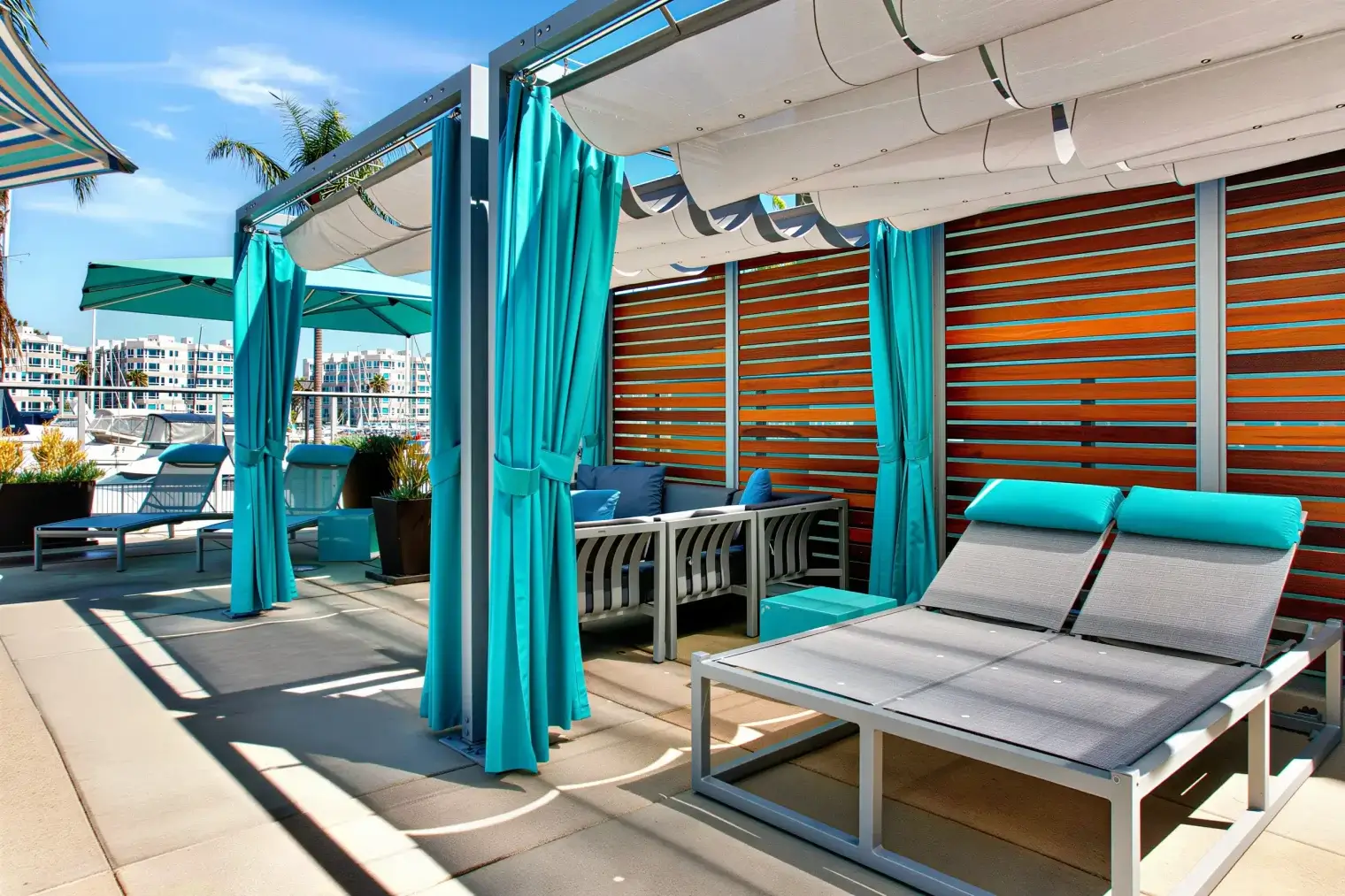Private-style rooftop cabanas and lounge chairs overlooking the Marina del Rey waterfront