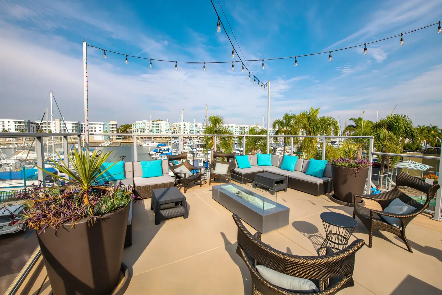 Rooftop lounge with marina views and outdoor seating at Harborside Marina Bay in Marina del Rey