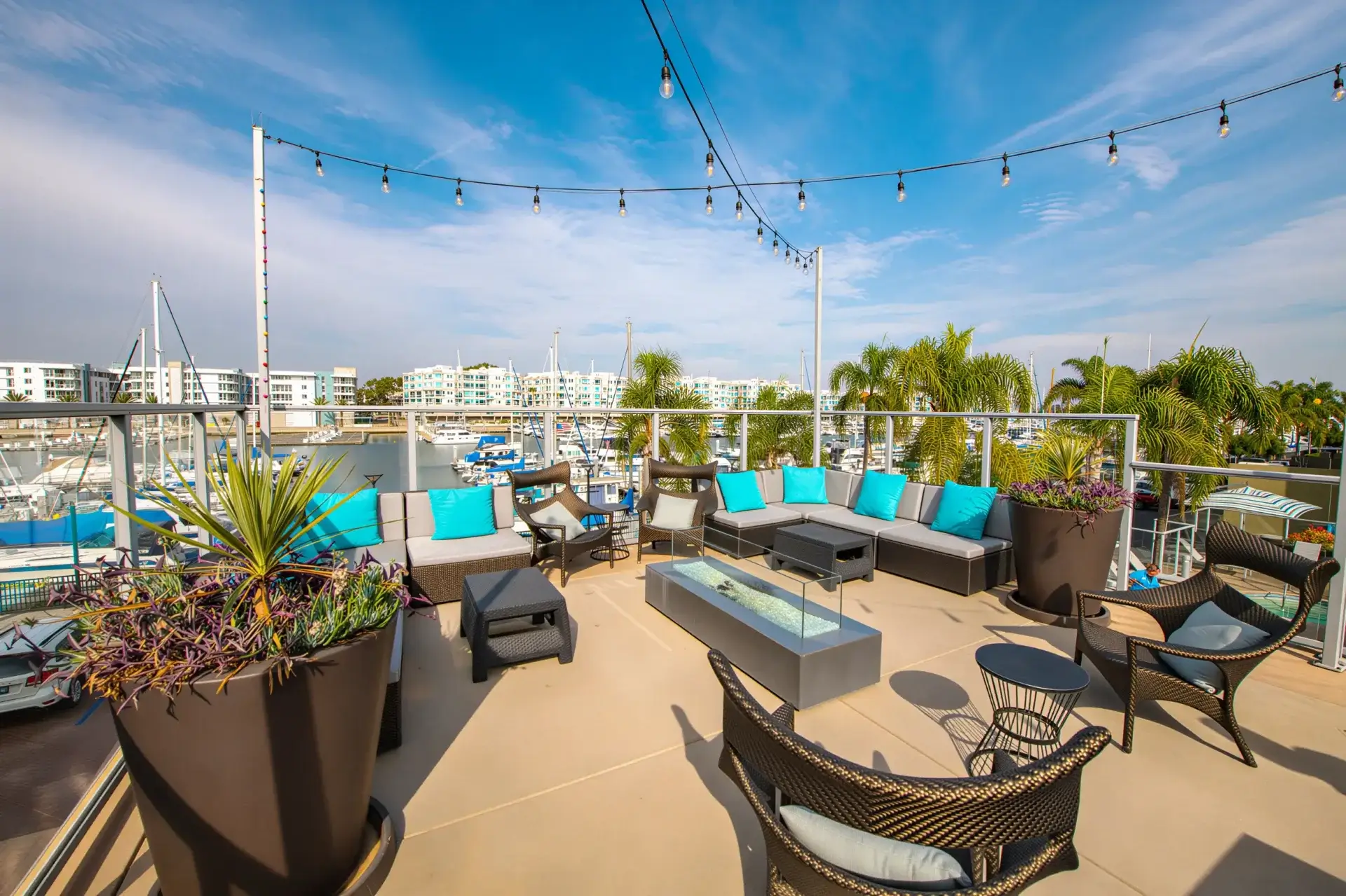 Rooftop lounge with marina views and outdoor seating at Harborside Marina Bay in Marina del Rey