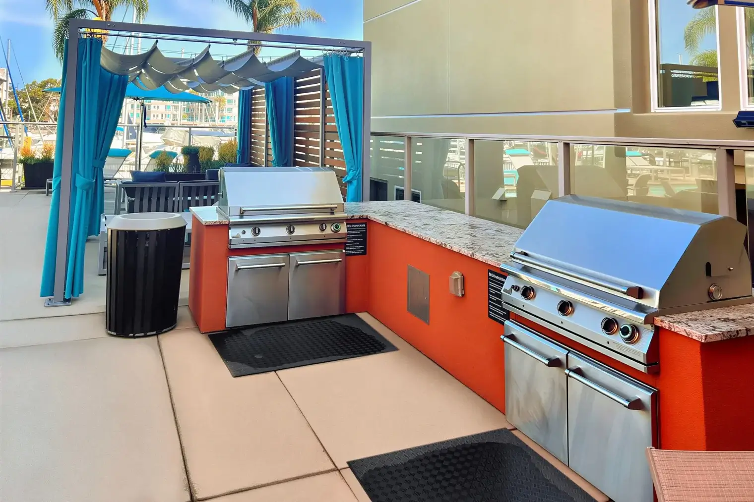 Rooftop barbecue grills and cabana seating at Harborside Marina Bay in Marina del Rey